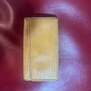 Authentic small mustard yellow Louis Vuitton key holder